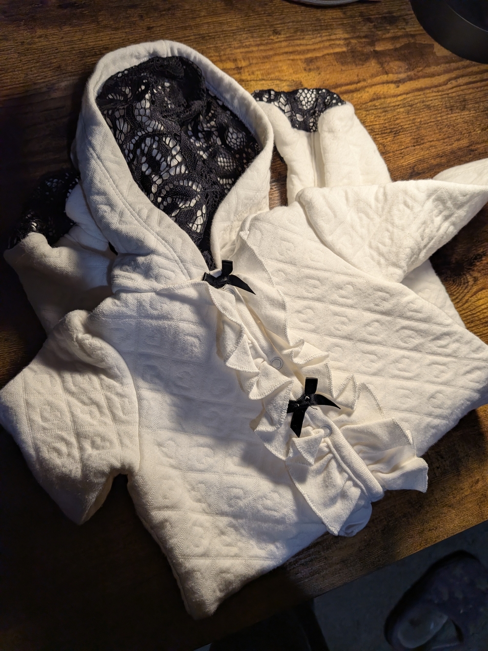 Girls White Hooded Lace-Trim Quilted Top with Ruffle Detail
